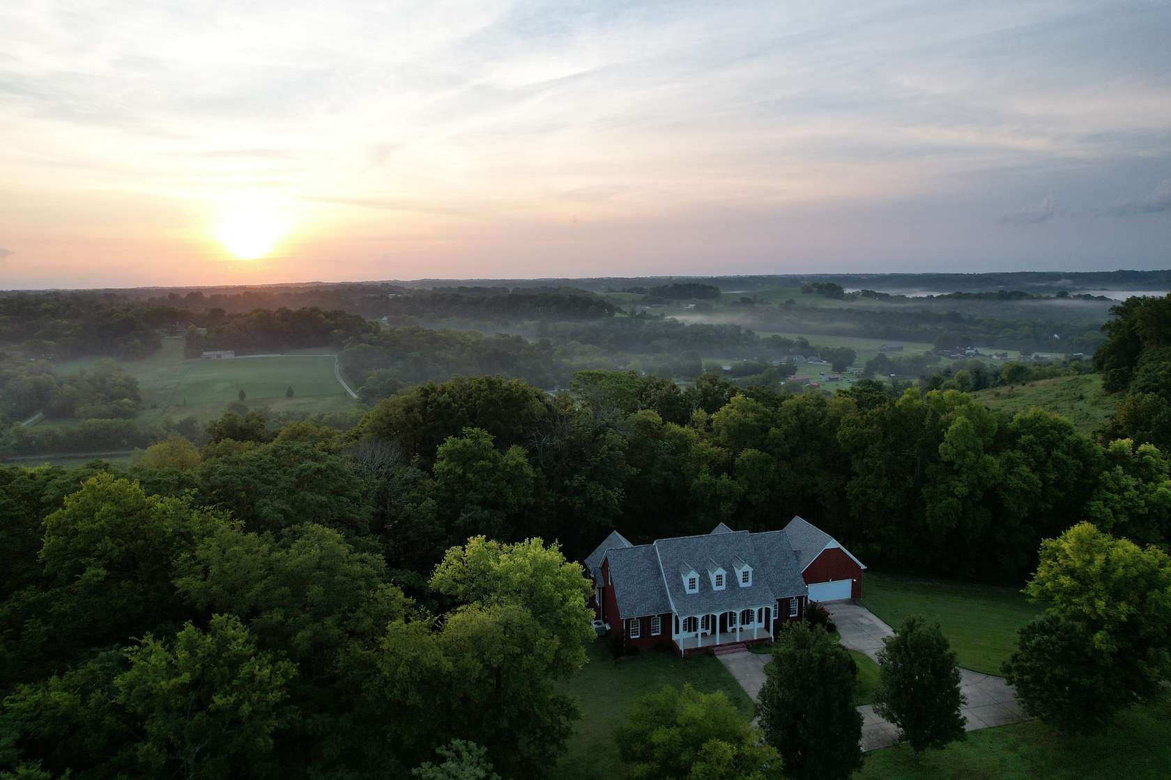 5 Acres of Land with Home for Sale in Santa Fe, Tennessee