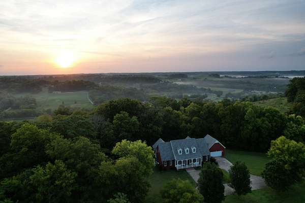 5 Acres of Land with Home for Sale in Santa Fe, Tennessee