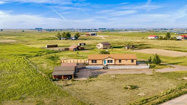 15 Acres of Land with Home for Sale in La Salle, Colorado