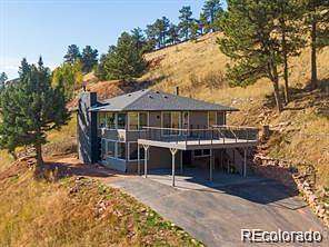 3.9 Acres of Land with Home for Auction in Boulder, Colorado