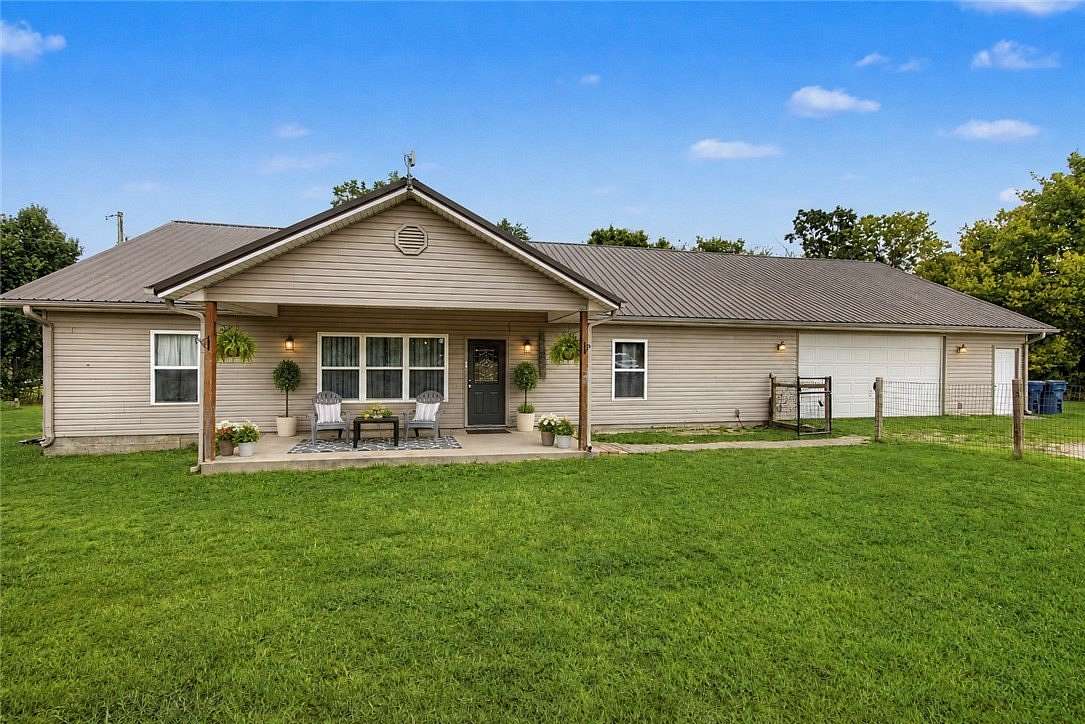 2.6 Acres of Land with Home for Sale in Gravette, Arkansas