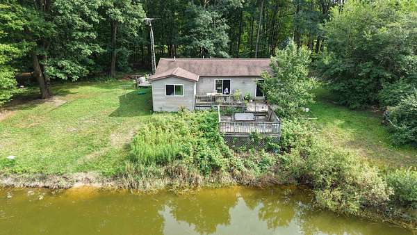 10 Acres of Land with Home for Sale in Hale, Michigan