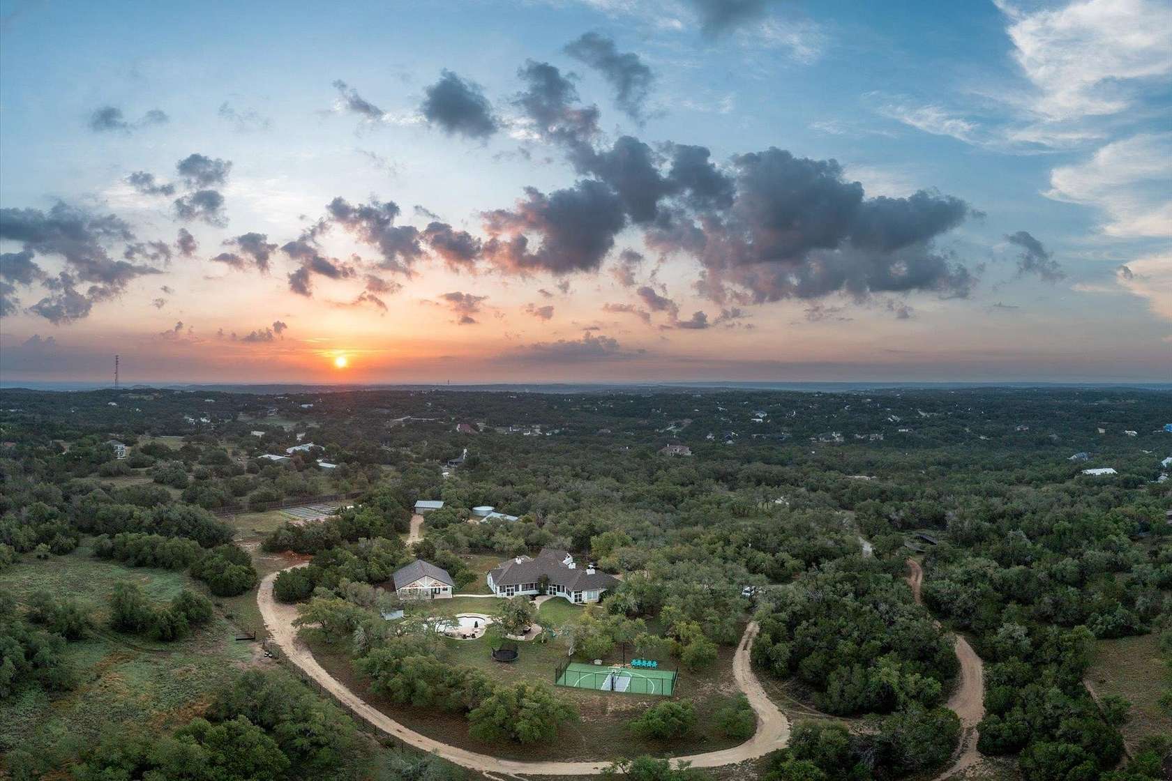31.8 Acres of Agricultural Land with Home for Sale in Dripping Springs, Texas