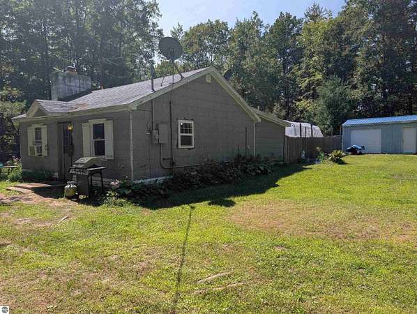 10.3 Acres of Recreational Land with Home for Sale in Prescott, Michigan