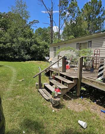 6.74 Acres of Land with Home for Sale in Ray City, Georgia