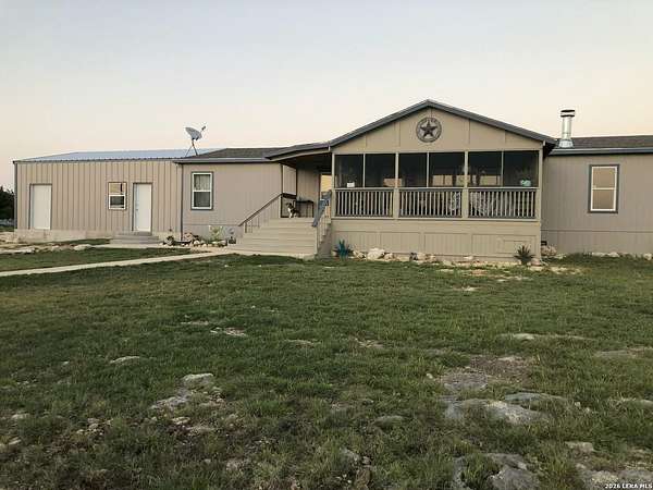 61.2 Acres of Agricultural Land with Home for Sale in Rocksprings, Texas