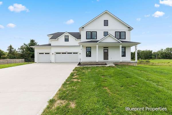 3.5 Acres of Land with Home for Sale in Alto, Michigan