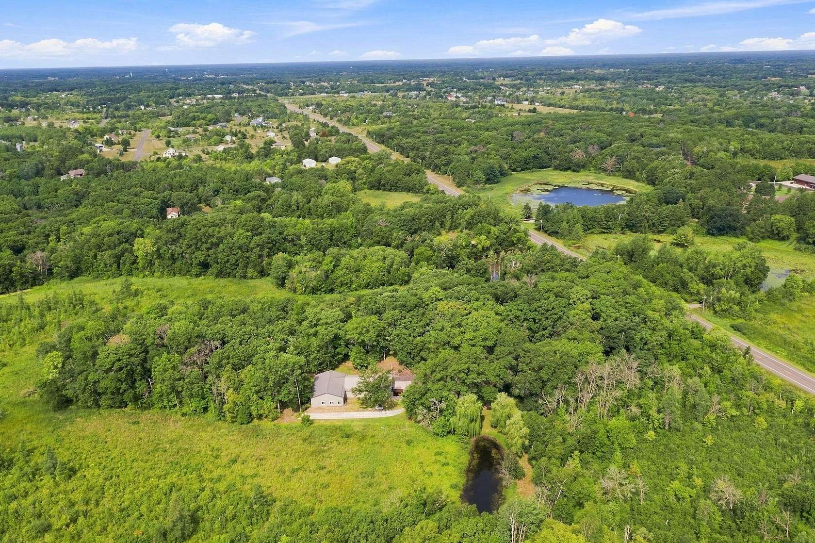 5 Acres of Land with Home for Sale in Zimmerman, Minnesota