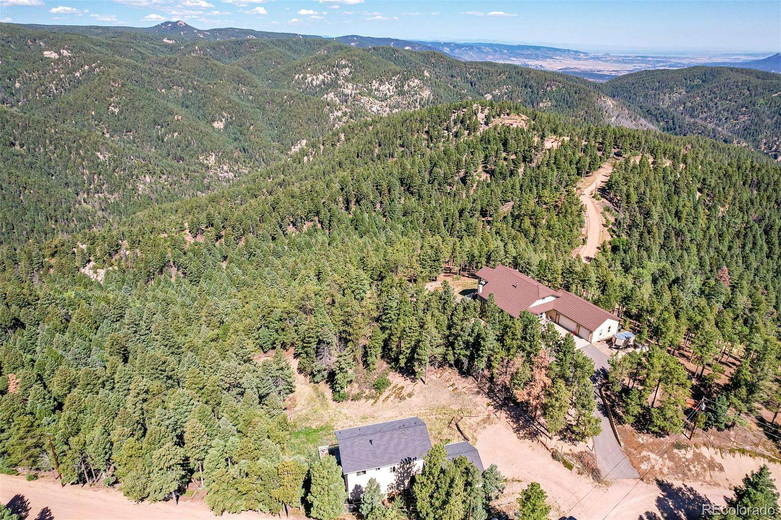 2.8 Acres of Land with Home for Sale in Larkspur, Colorado