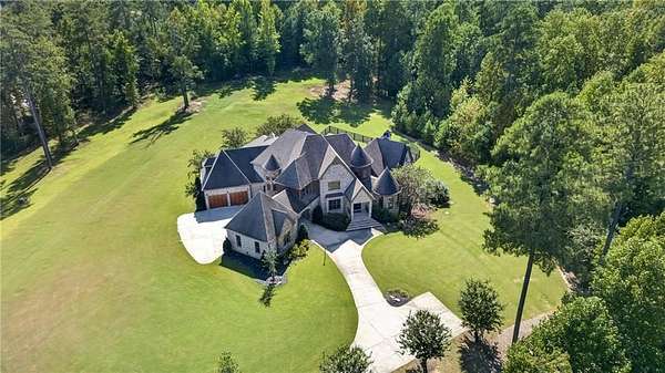 7.39 Acres of Land with Home for Sale in Milton, Georgia