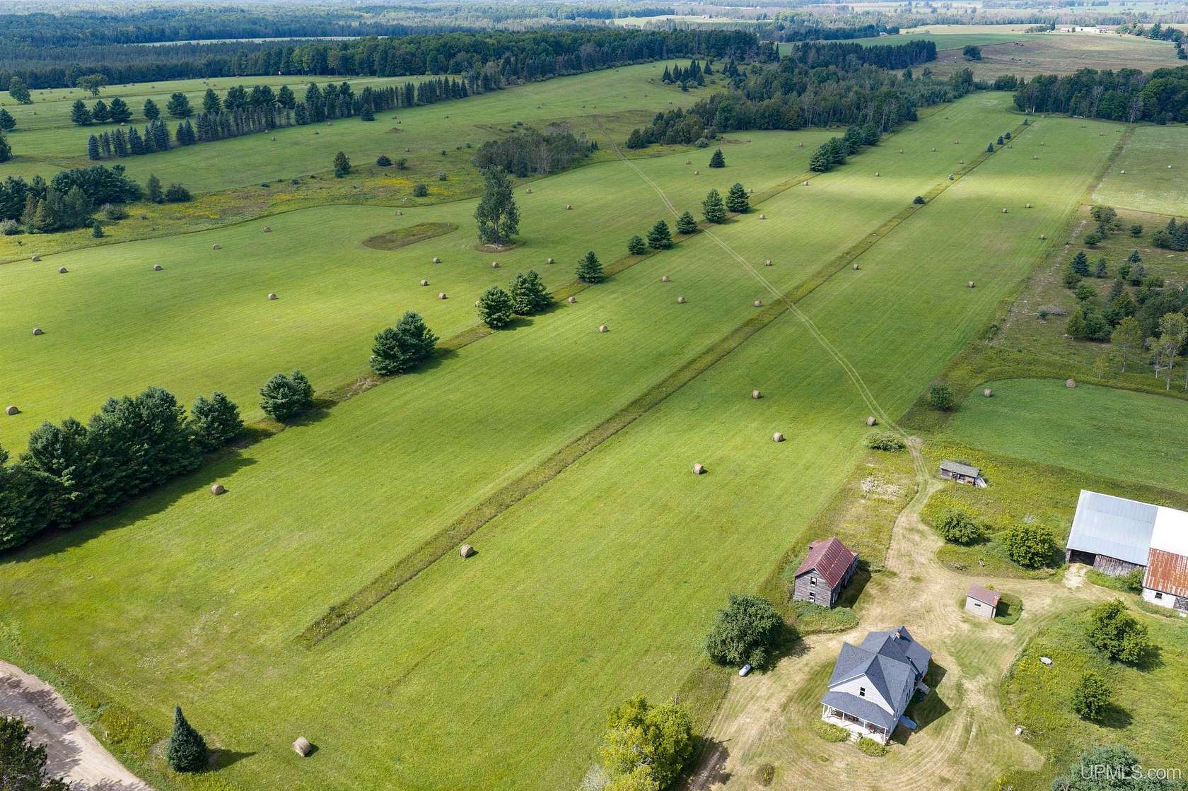 209 Acres of Recreational Land with Home for Sale in Bark River, Michigan