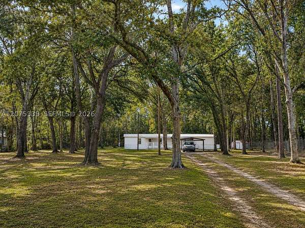 2 Acres of Land with Home for Sale in Gainesville, Florida