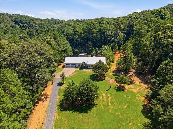 5.59 Acres of Land with Home for Sale in Lindale, Georgia