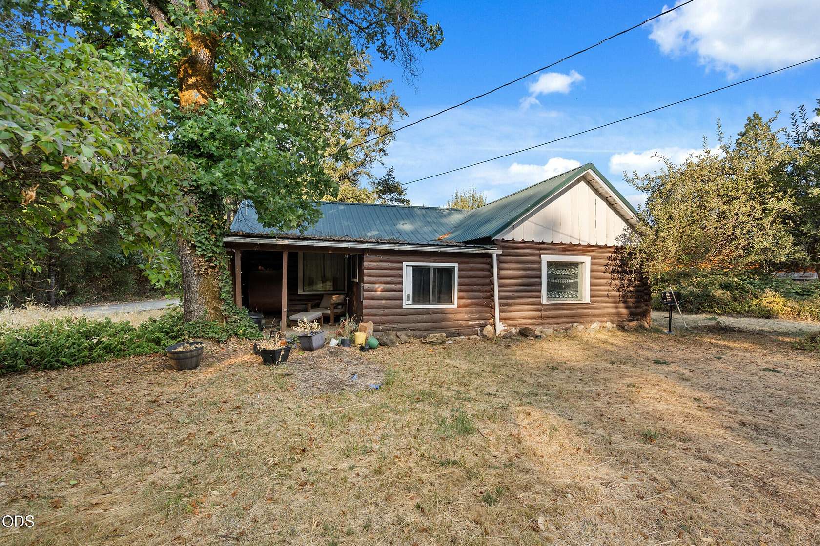 6.72 Acres of Land with Home for Sale in Cave Junction, Oregon