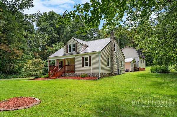 15.8 Acres of Land with Home for Sale in Lansing, North Carolina