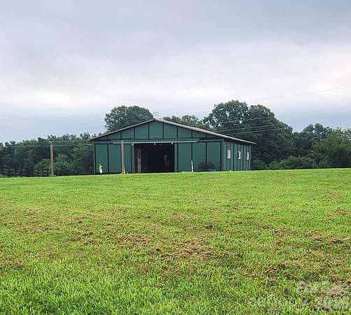 12.1 Acres of Land with Home for Sale in Connelly Springs, North Carolina