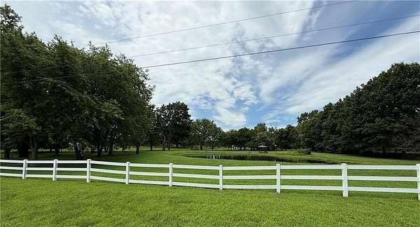 10 Acres of Land with Home for Sale in Harrisonville, Missouri