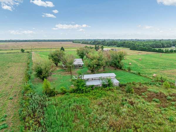 30 Acres of Land with Home for Sale in Deport, Texas