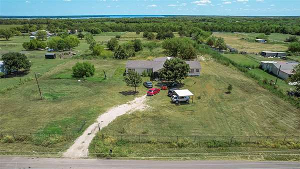5.25 Acres of Land with Home for Sale in Quinlan, Texas