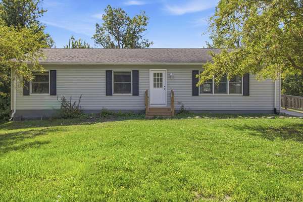 4.89 Acres of Land with Home for Sale in Holly, Michigan