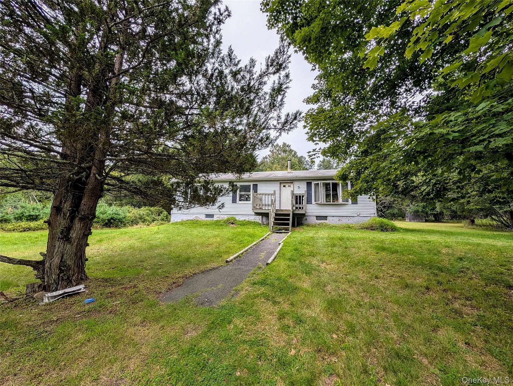 7.14 Acres of Land with Home for Sale in Swan Lake, New York