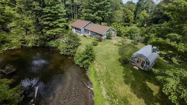 3.2 Acres of Land with Home for Sale in Howard City, Michigan