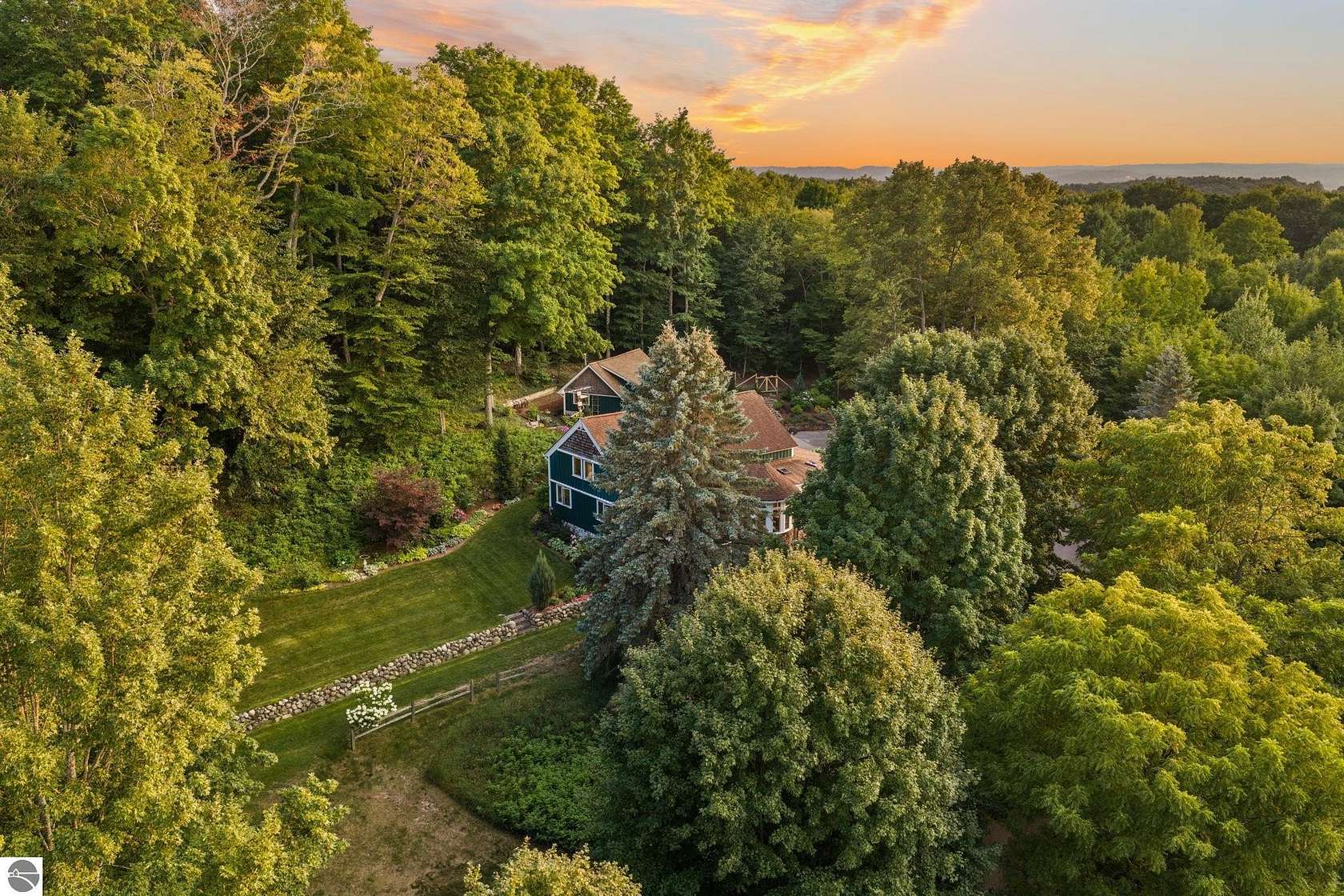 5 Acres of Land with Home for Sale in Cedar, Michigan