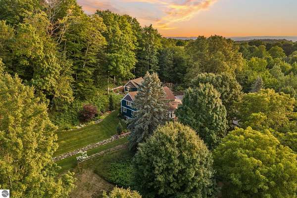 5 Acres of Land with Home for Sale in Cedar, Michigan