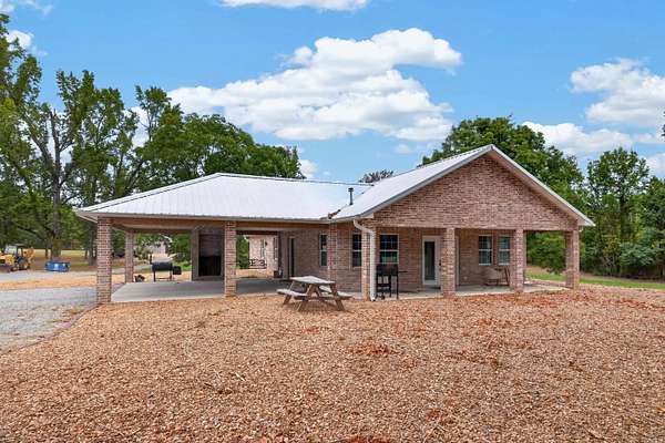 7.5 Acres of Land with Home for Sale in Traskwood, Arkansas