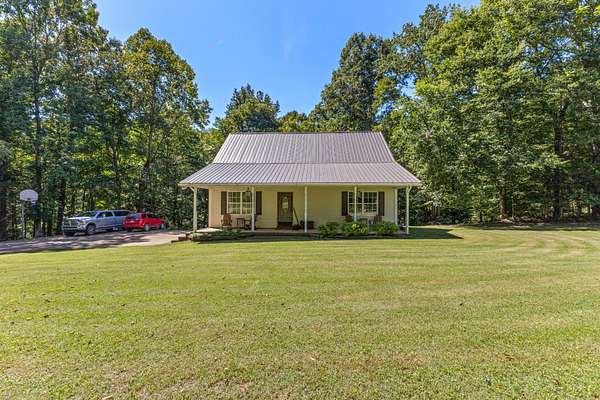 5 Acres of Land with Home for Sale in Dickson, Tennessee