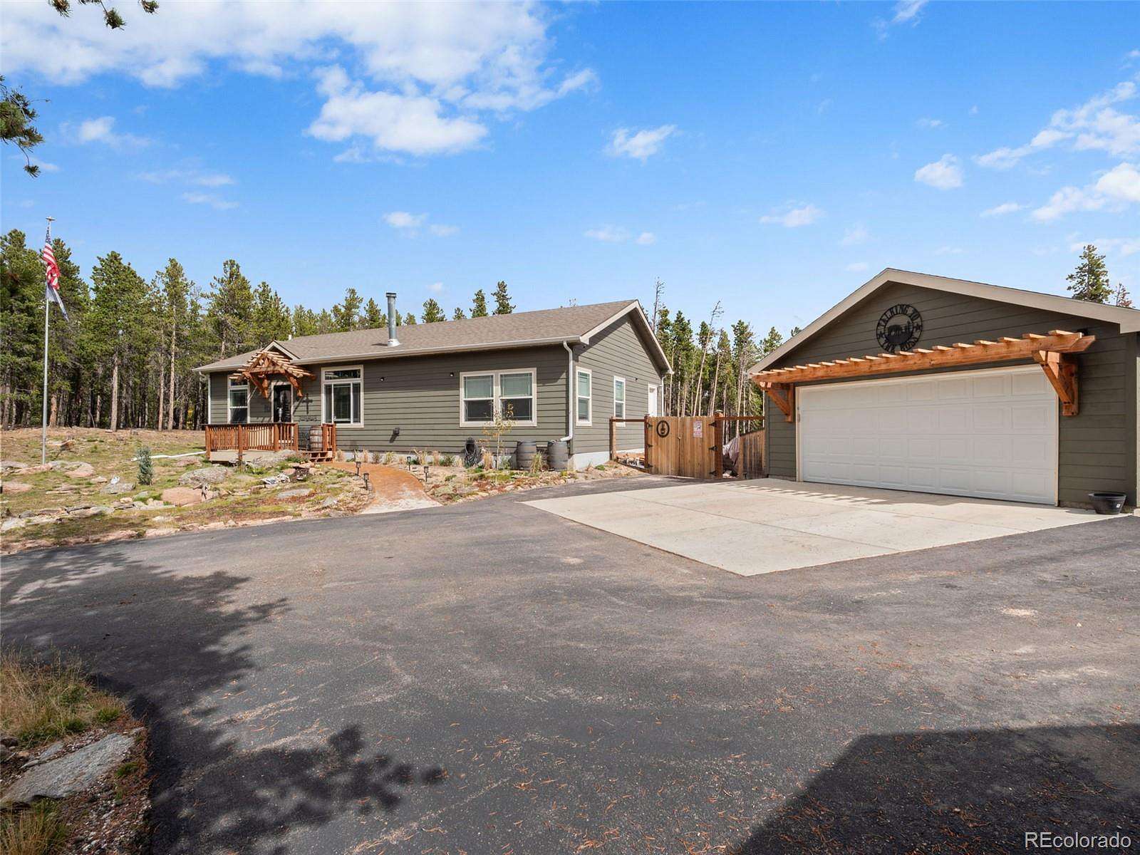 2 Acres of Land with Home for Sale in Evergreen, Colorado