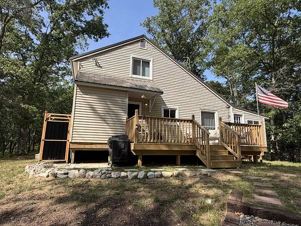 10.5 Acres of Recreational Land with Home for Sale in Irons, Michigan