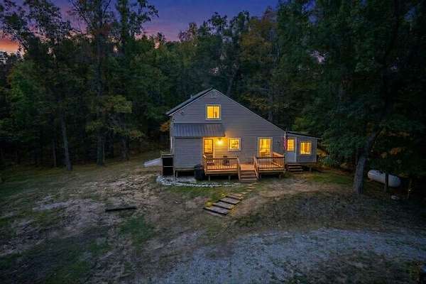 10.5 Acres of Recreational Land with Home for Sale in Irons, Michigan