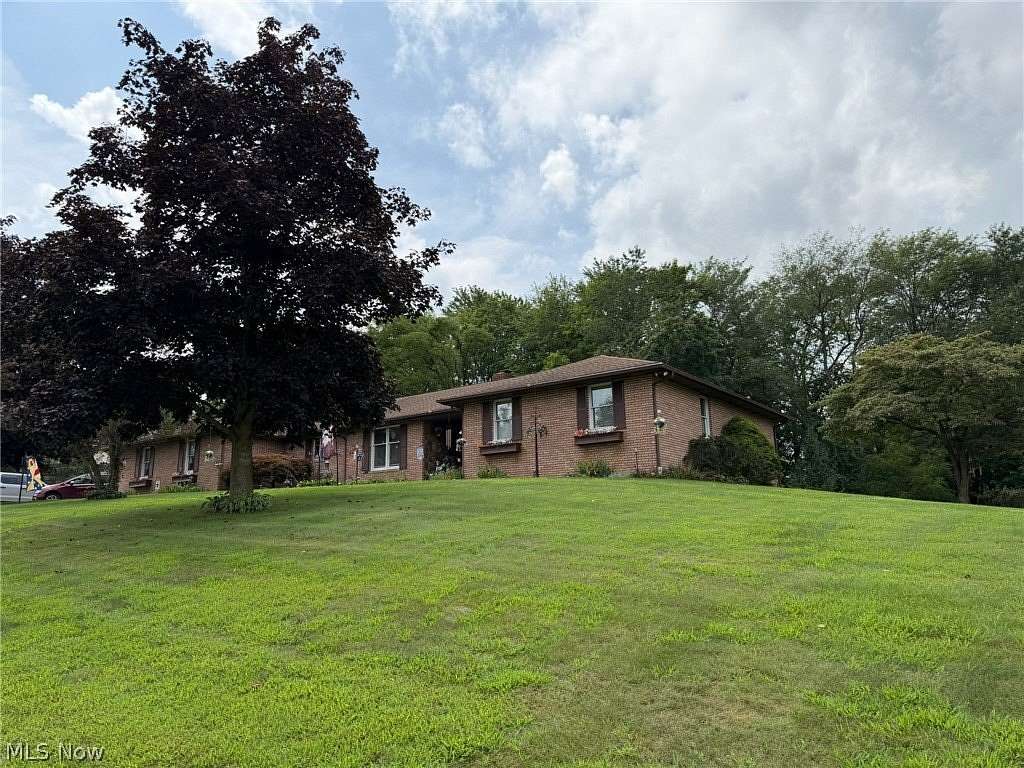 4 Acres of Land with Home for Sale in North Lawrence, Ohio