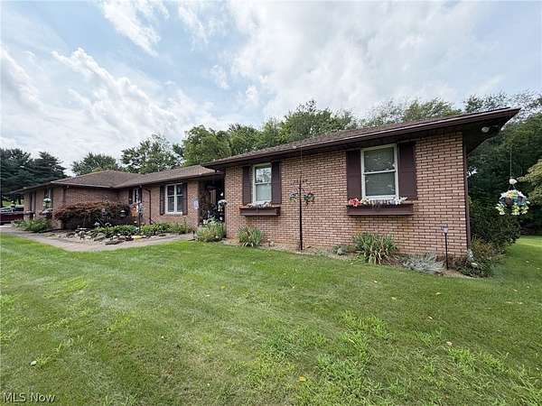 4 Acres of Land with Home for Sale in North Lawrence, Ohio