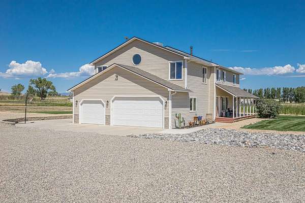5.12 Acres of Land with Home for Sale in Loma, Colorado