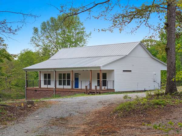 25.7 Acres of Land with Home for Sale in Florence, Alabama