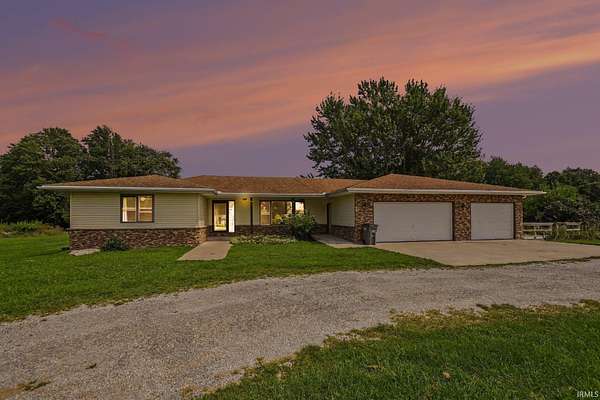 7 Acres of Land with Home for Auction in Topeka, Indiana