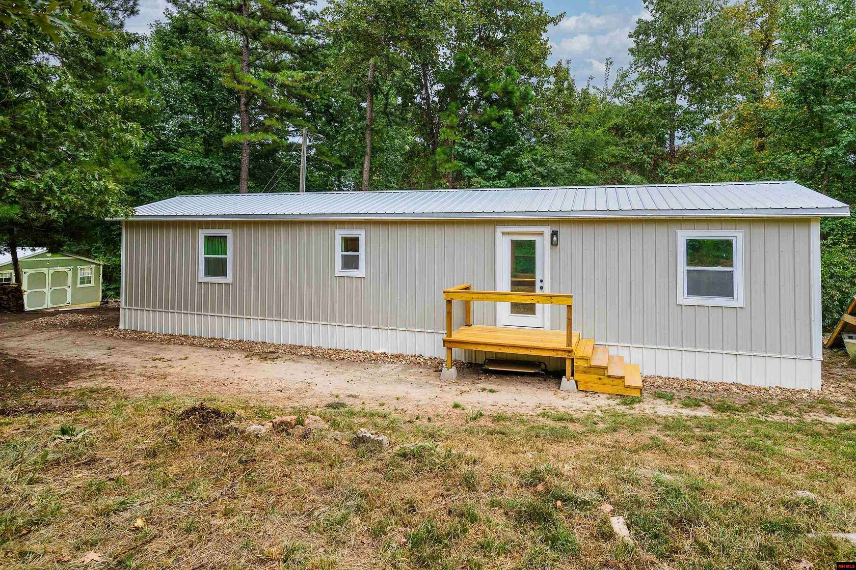 7.8 Acres of Land with Home for Sale in Norfork, Arkansas