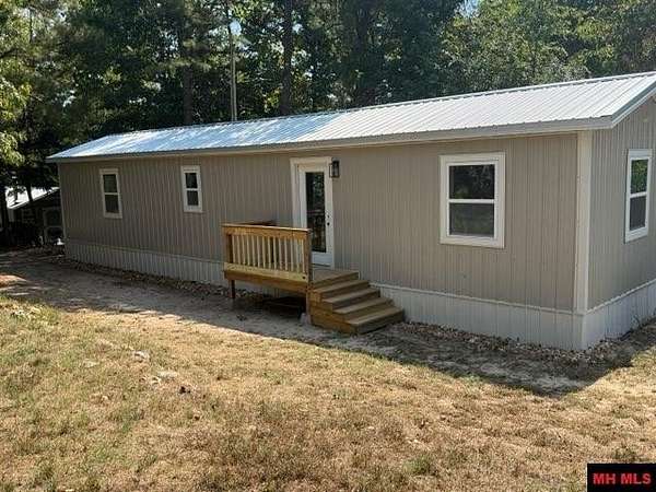 7.8 Acres of Land with Home for Sale in Norfork, Arkansas