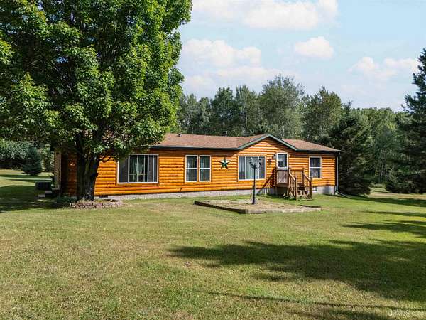12.6 Acres of Land with Home for Sale in Gaastra, Michigan