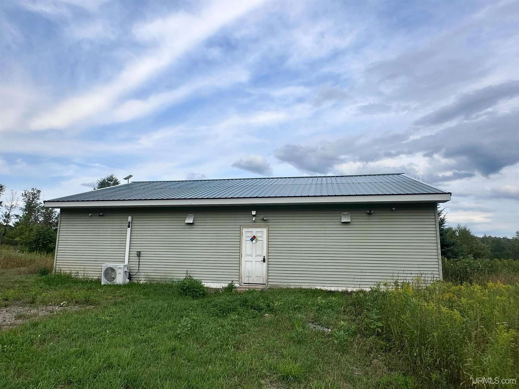 8.18 Acres of Improved Commercial Land for Sale in Crystal Falls, Michigan