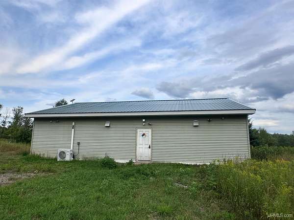 8.18 Acres of Improved Commercial Land for Sale in Crystal Falls, Michigan