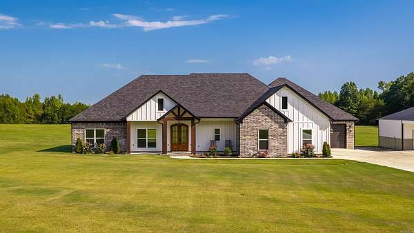 7.18 Acres of Land with Home for Sale in Greenbrier, Arkansas