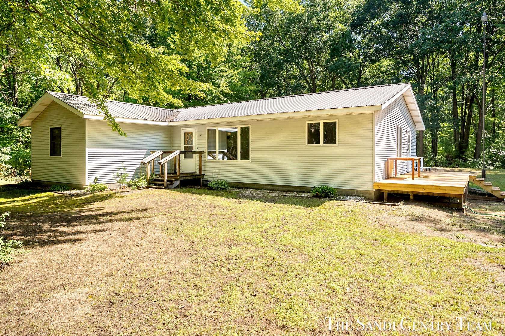 10 Acres of Land with Home for Sale in Twin Lake, Michigan