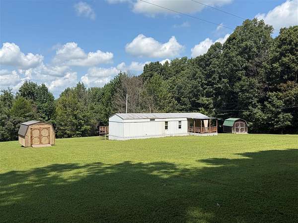 2.67 Acres of Land with Home for Sale in Scottsville, Kentucky
