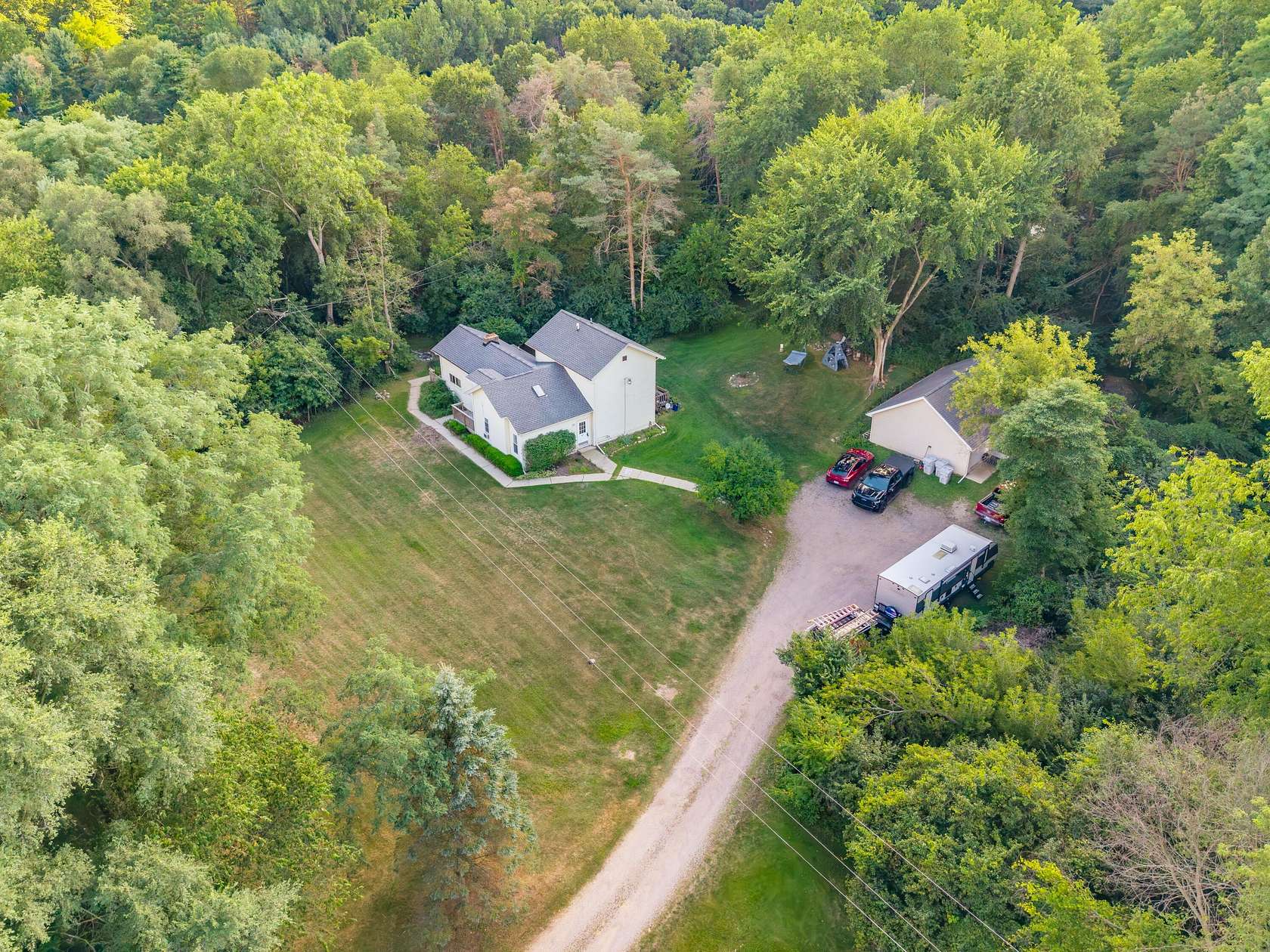 1.5 Acres of Land with Home for Sale in Pinckney, Michigan