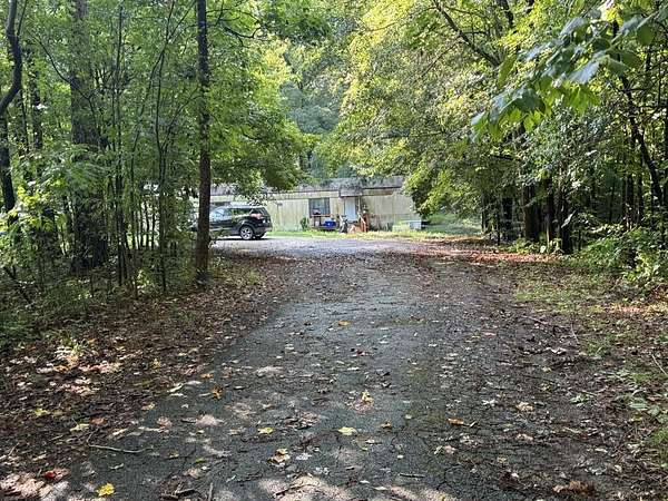 29.2 Acres of Land with Home for Sale in Dawnville, Georgia