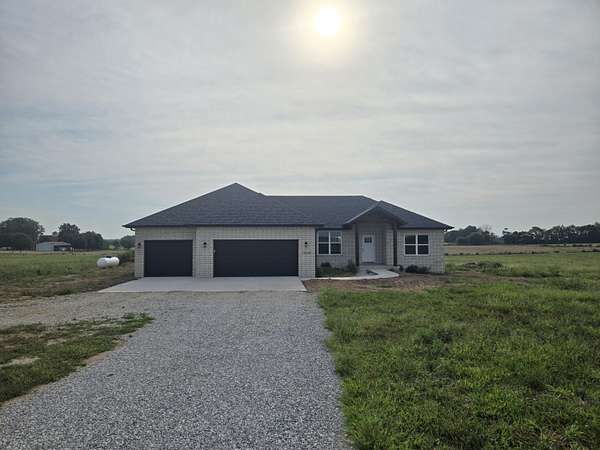 9.25 Acres of Land with Home for Sale in Billings, Missouri