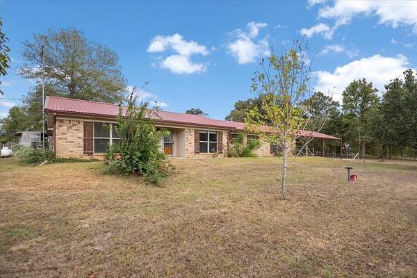 9.85 Acres of Land with Home for Sale in Gilmer, Texas